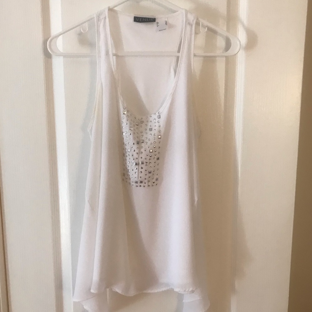 White sleeveless top